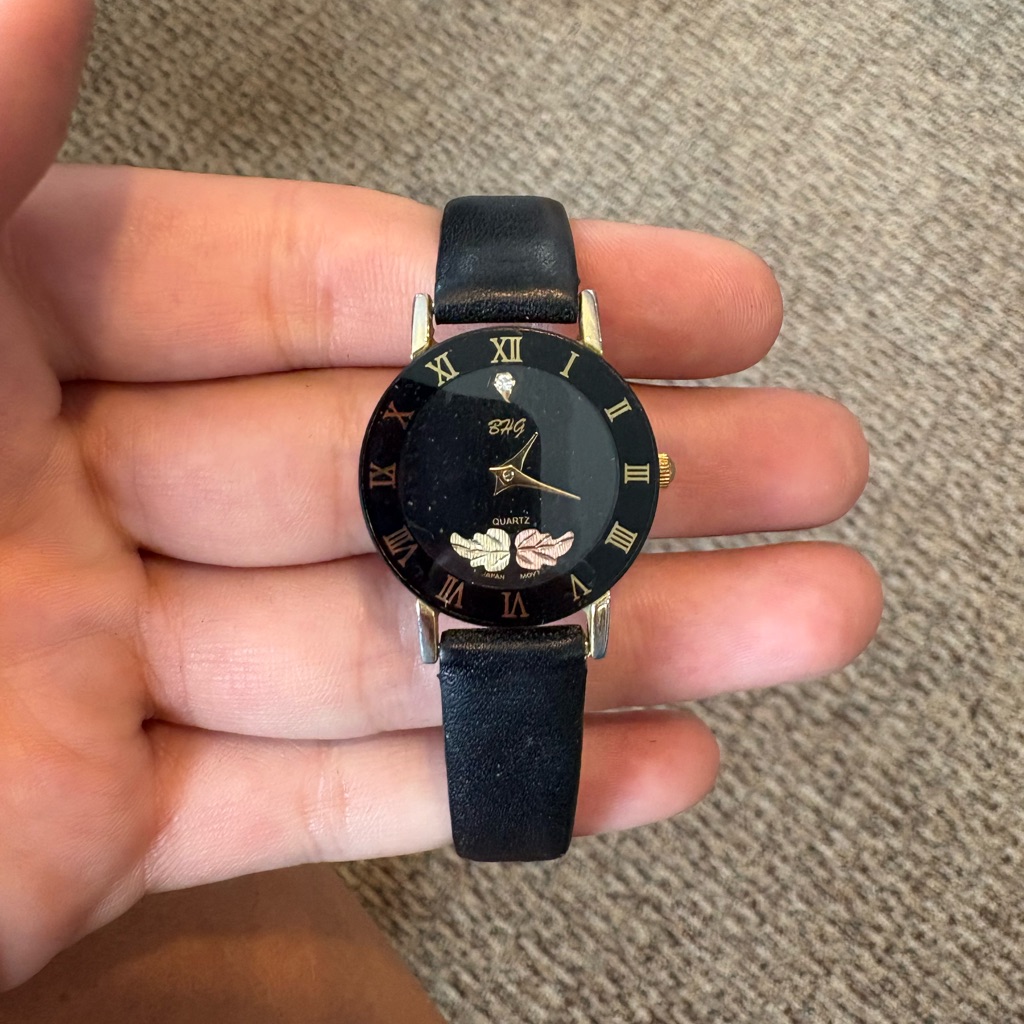 Black Leather Strap Watch With Gold Accents